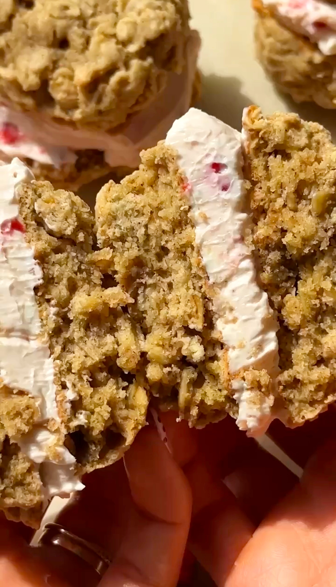 Fluffy and soft oatmeal cookies with a strawberry cream cheese filling.