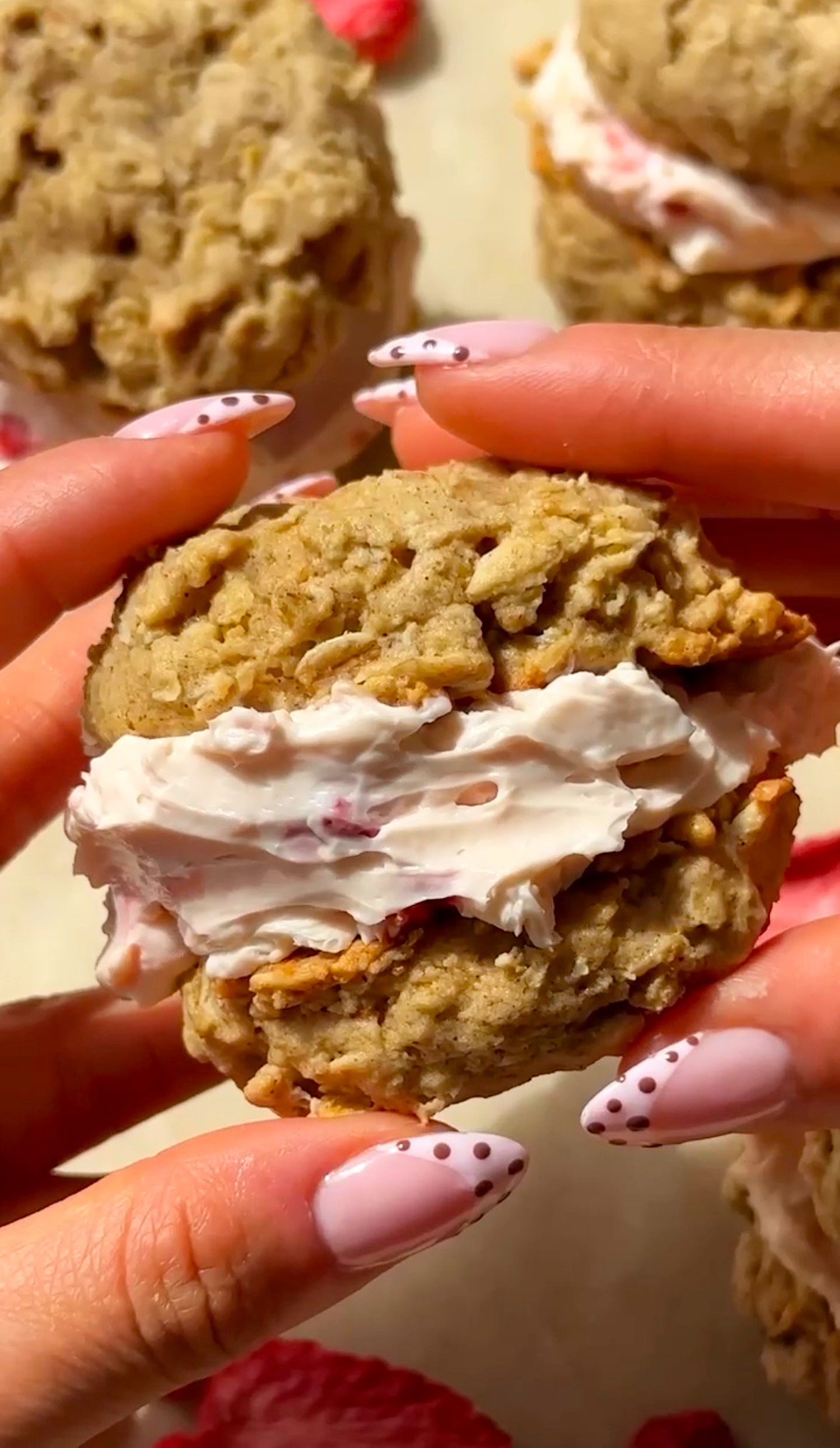 Fluffy and soft oatmeal cookies with a strawberry cream cheese filling.
