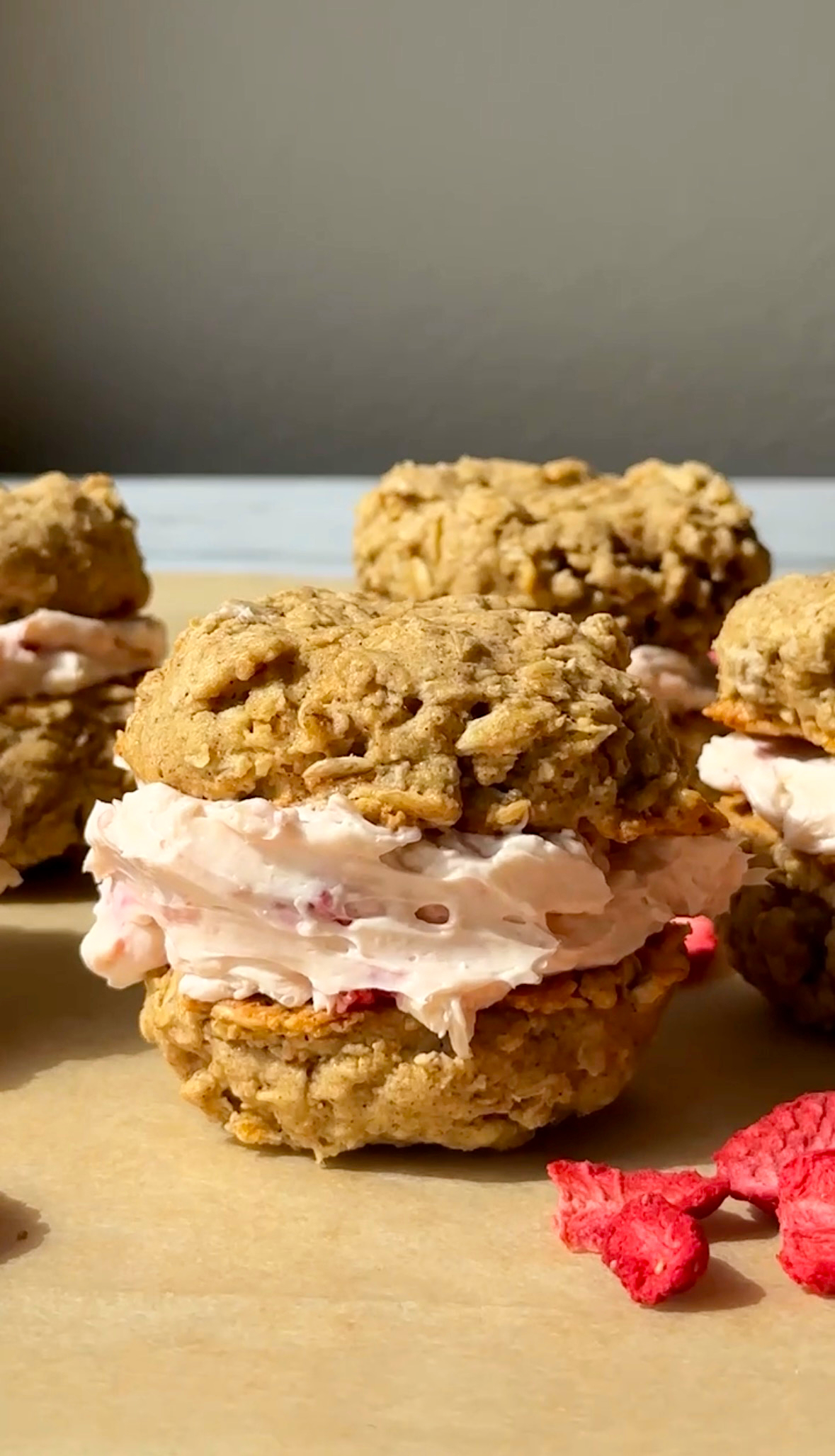 Fluffy and soft oatmeal cookies with a strawberry cream cheese filling.